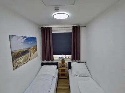 Schlafzimmer mit 2 Einzelbetten
