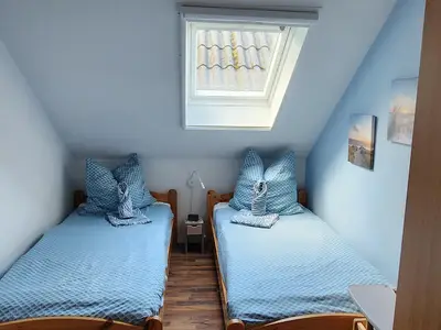 Schlafzimmer mit Einzelbetten