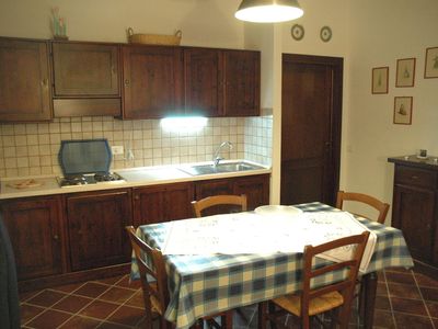 Kochbereich. Wohnung n.7: Wohnzimmer mit Kochnische