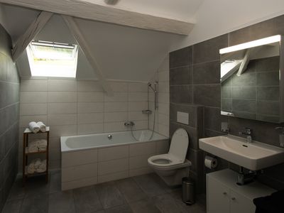 Gite vue salle de bain avec machine à laver