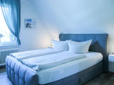 Cuxland-Fewo-Service - Fewo Schmidt - Schlafzimmer
