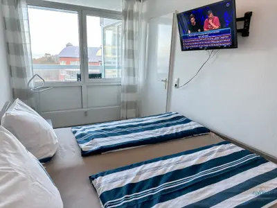 Cuxland-Fewo-Service - Haus Frische Brise- Wohnung 8.09  - Schlafzimmer