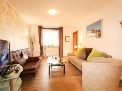 Cuxland-Fewo-Service-Haus Elbe-Wohnung 12a-Wohnzimmer