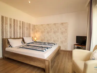 Cuxland-Fewo-Service-Haus Elbe-Wohnung 16-Wohn/Schlafraum
