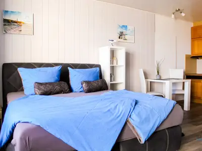 Cuxland-Fewo-Service - Haus Atlantic  - Wohnung 607 A  - Wohn - Schlafzimmer