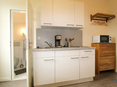 Cuxland-Fewo-Service - Haus Frauenpreis-Wohnung 64 - Wohn-Schlazimmer-Küchenzeile