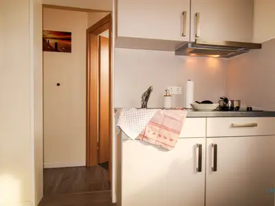 Cuxland-Fewo-Service - Haus Frauenpreis-Wohnung 68 - Wohn-Schlazimmer-Küchenzeile