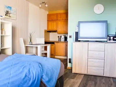 Cuxland-Fewo-Service - Haus Atlantic  - Wohnung 607 A  - Wohn - Schlafzimmer