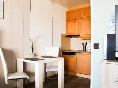 Cuxland-Fewo-Service - Haus Atlantic  - Wohnung 607 A  -  Kochnische - Esszimmer