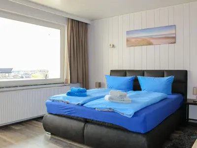 Cuxland-Fewo-Service - Haus Atlantic  - Wohnung 607 B  - Wohn - Schlafzimmer