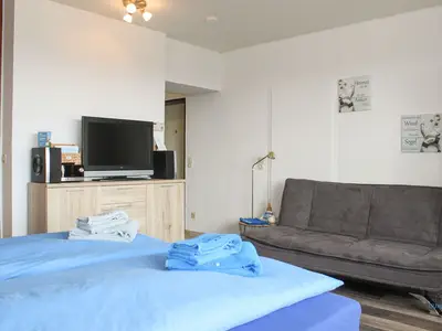 Cuxland-Fewo-Service - Haus Atlantic  - Wohnung 607 B  - Wohn - Schlafzimmer