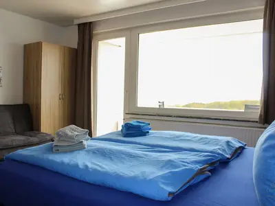 Cuxland-Fewo-Service - Haus Atlantic  - Wohnung 607 B  - Wohn - Schlafzimmer