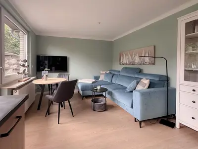 Wohn-/Essraum mit Zugang zur Terrasse