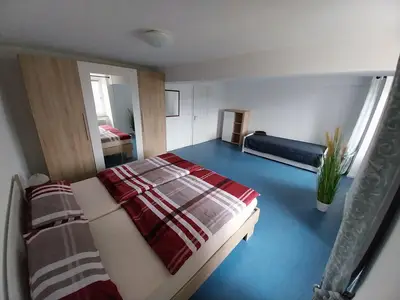 Doppelzimmer mit zusätzlichem Kojenbett