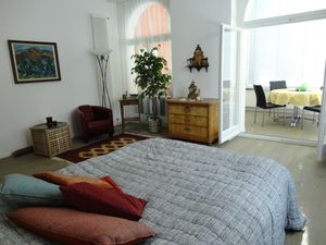 Schlafzimmer mit Sitzecke