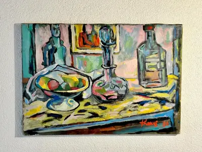 Kleines Original eines lokalen Künstlers über dem Schreibtisch