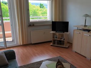 Wohnzimmer mit Balkon