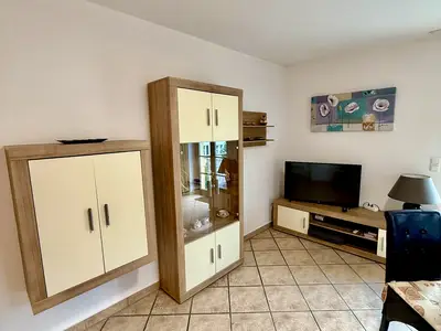 Wohnzimmer mit Balkon