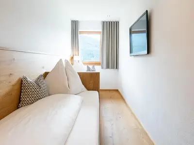 Schlafzimmer mit getrennten Betten