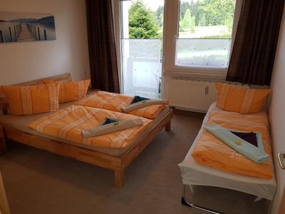 Schlafzimmer mit Reservebett