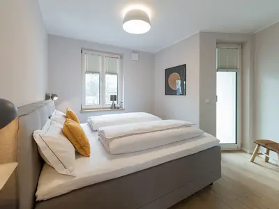 Suites MITTE - Schlafzimmer/Boxspringbett