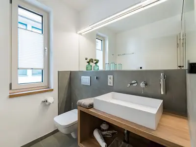 Suites MITTE - Badezimmer mit bodengleicher Dusch e