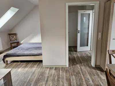 Wohn-Schlafraum Apartment 6