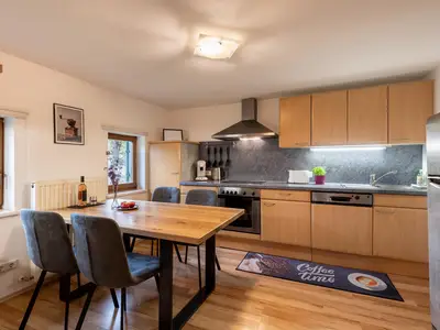 Gaberhelhof_Steinerner_Tisch_28_Ellmau_Appartement