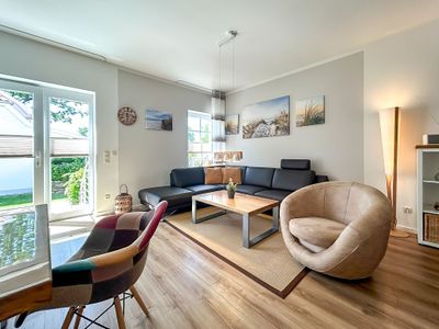 Wohnzimmer mit gemütlicher Wohnlandschaft