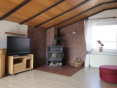 Wohnzimmer mit Kamin