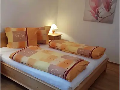 Ferienwohnung Alpenglühen - 1. Schlafzimmer