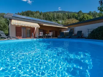 Außenpool im Sommer - Ferienwohnungen Angermaier