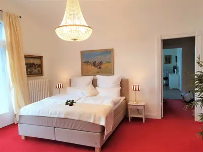 zweites Schlafzimmer mit Sitzecke und TV