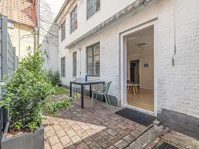 Wohnbereich mit Zugang zur Terrasse