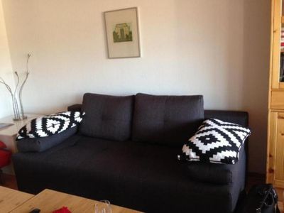 Wohnzimmer mit Schlafcouch für 2