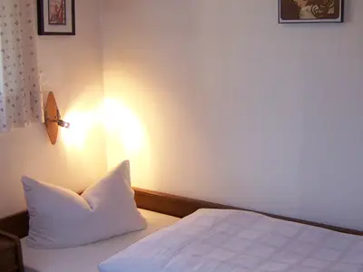 Schlafzimmer 2 mit Einzelbett Ferienwohnung 5