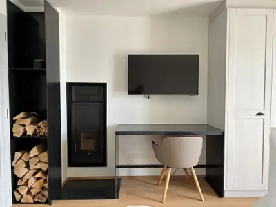 West-Schlafzimmer: von hier aus wird der Kachelofen beheizt