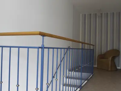 Treppenhaus zur Ferienwohnung im 1. Stock