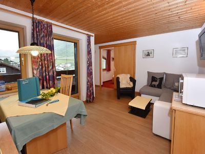 Wohnung Panorama - Gemütliche Wohnküche mit ausziehbarer Couch - Galtür Tirol