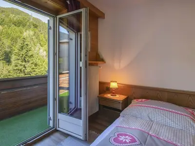 Schlafzimmer mit Blick auf die Berge