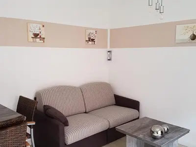 Wohnbereich mit ausziehbarem Schlafsofa