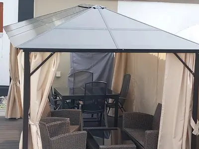 Pergola mit Gartenmöbel zu nutzen