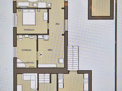 Ein Grundriss von der Ferienwohnung und vom Hof