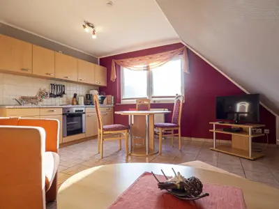 Wohnzimmer mit integrierter Küche