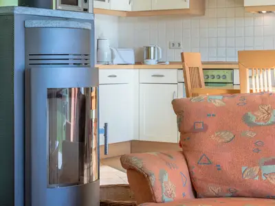 Ferienwohnung Storchenrast Kamin im Wohnbereich