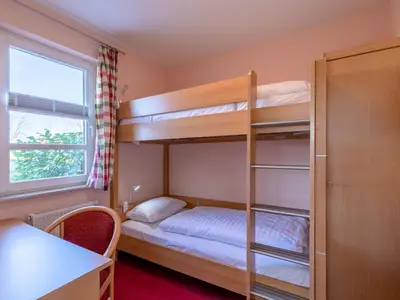 Ferienwohnung Storchenrast Schlafzimmer mit einem Etagenbett