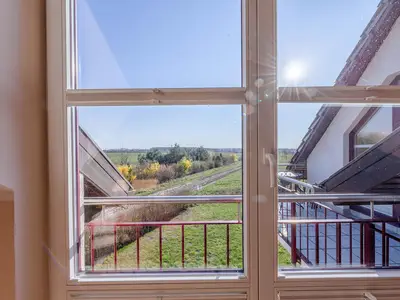 Ferienwohnung Storchenflug Ausblick aus der Küche in die Natur