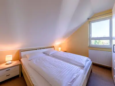 Ferienwohnung Storchenflug Schlafzimmer mit Doppelbett