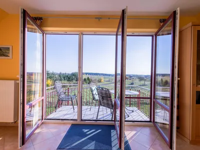 Ferienwohnung Storchenhorst Balkon mit Sitzmöbeln