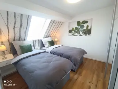 Schlafzimmer 2 mit zwei Einzelbetten je 90cm